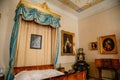 Castle interior. Bedroom with blue ÃÂanopy bed. Castle Duchcov, Czech Republic